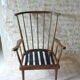 Fauteuil en bois dossier éventail baumann