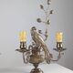 Pair of wall sconces with parrots and leaves