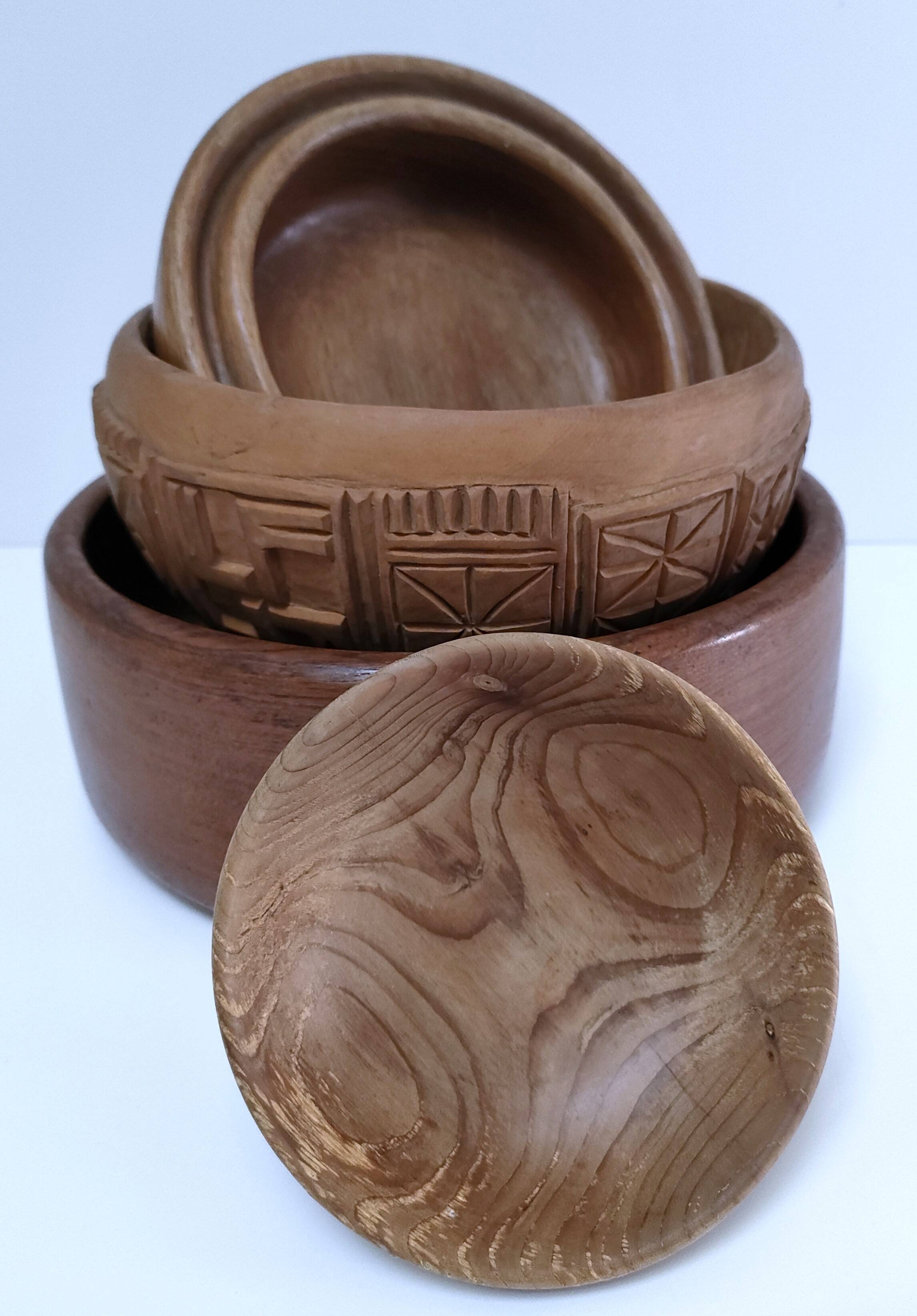 four vintage solid wood bowls