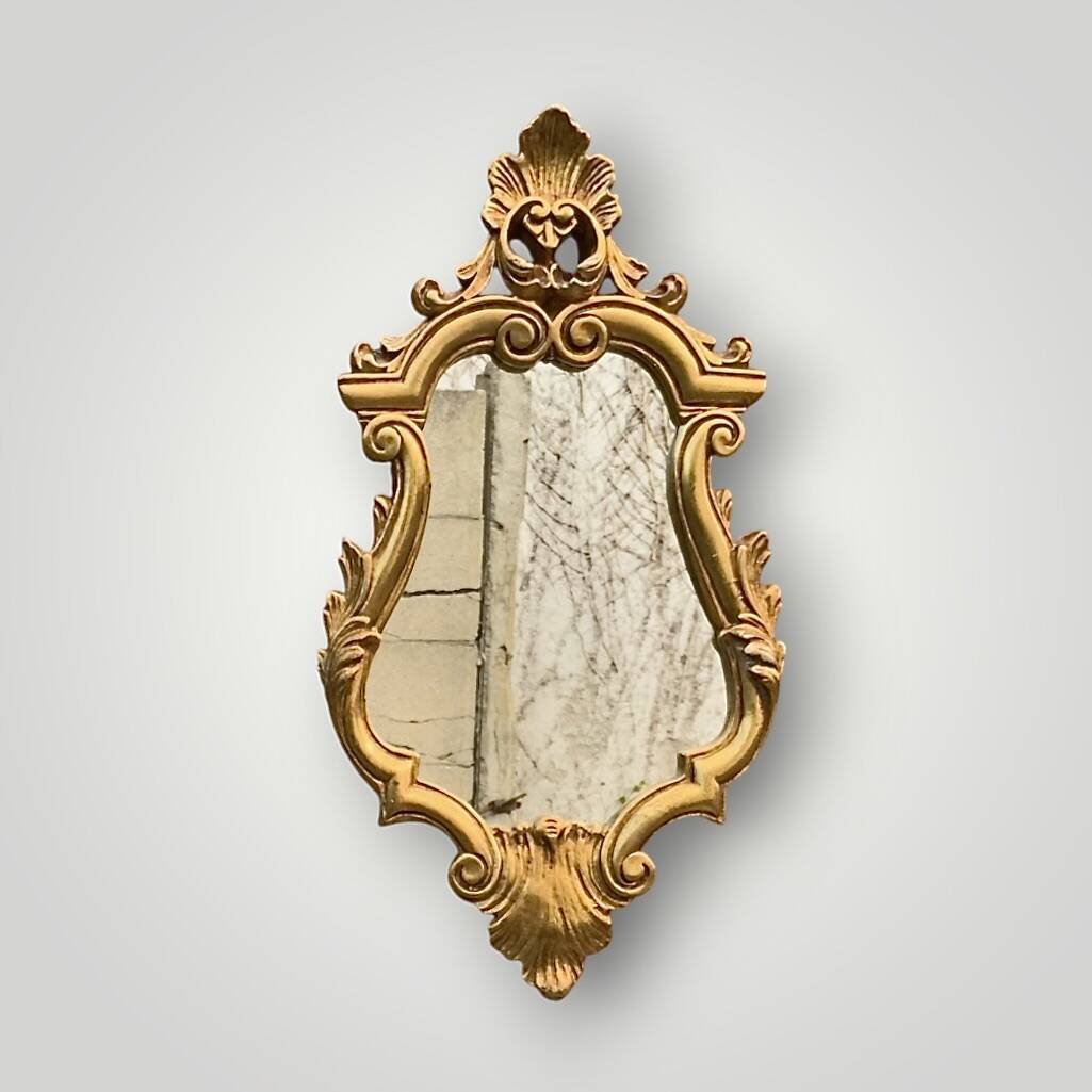 Vintage Rococo wall mirror in gilded resin