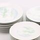 Set of 7 porcelain plates Lourioux Deshoulières - dessert, plates and deep bowls.
