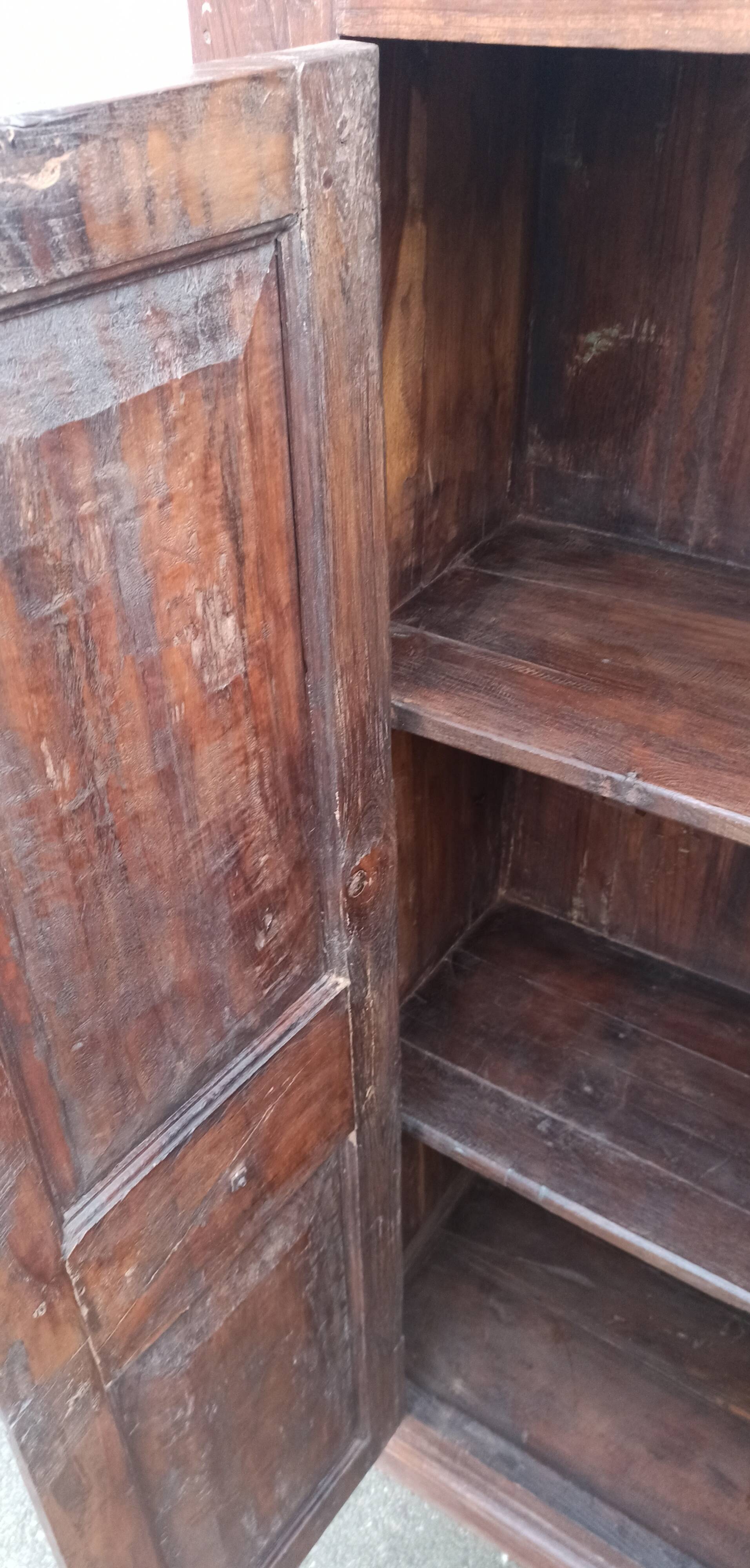Old wooden cabinet with ceramic handles
