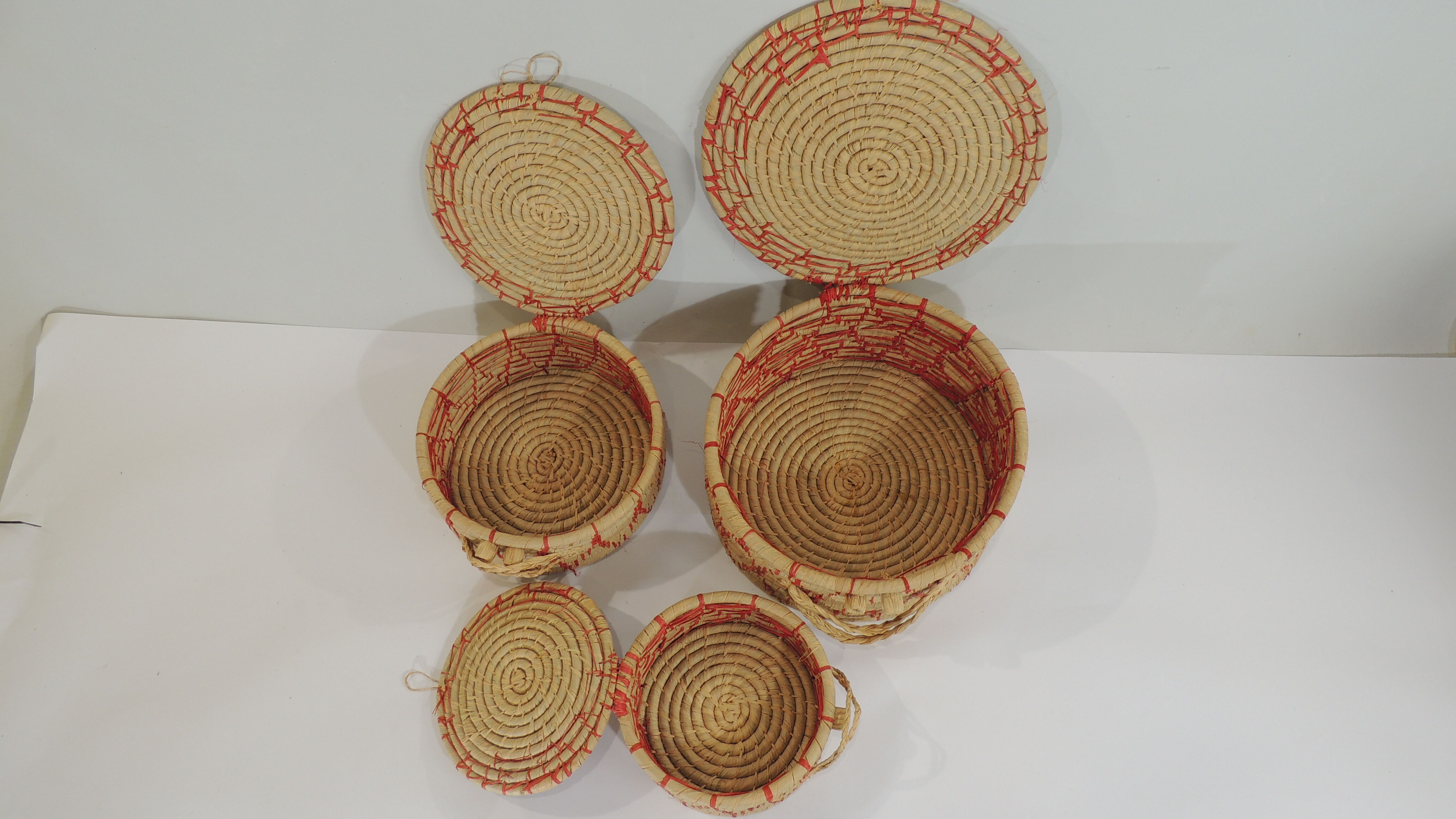 Set of three african raffia basket