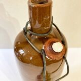 Bouteille / bouillotte en grès émaillé marron