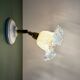 Vintage tulip glass wall light in transparent, slightly pearlescent white.