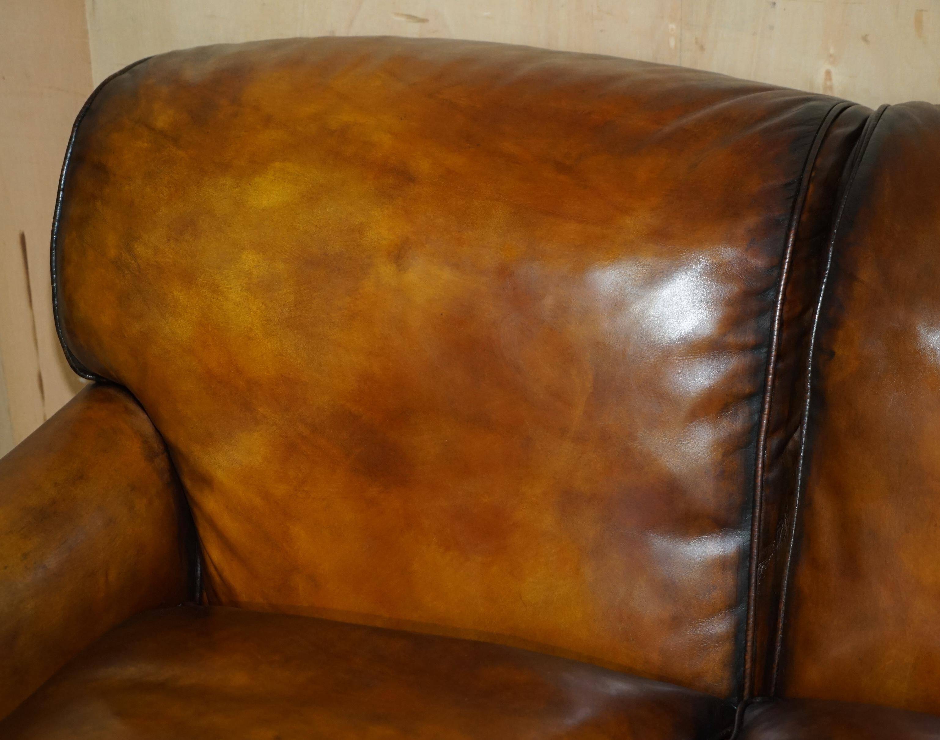 Howard & Son restored leather canapé, width 145 cm