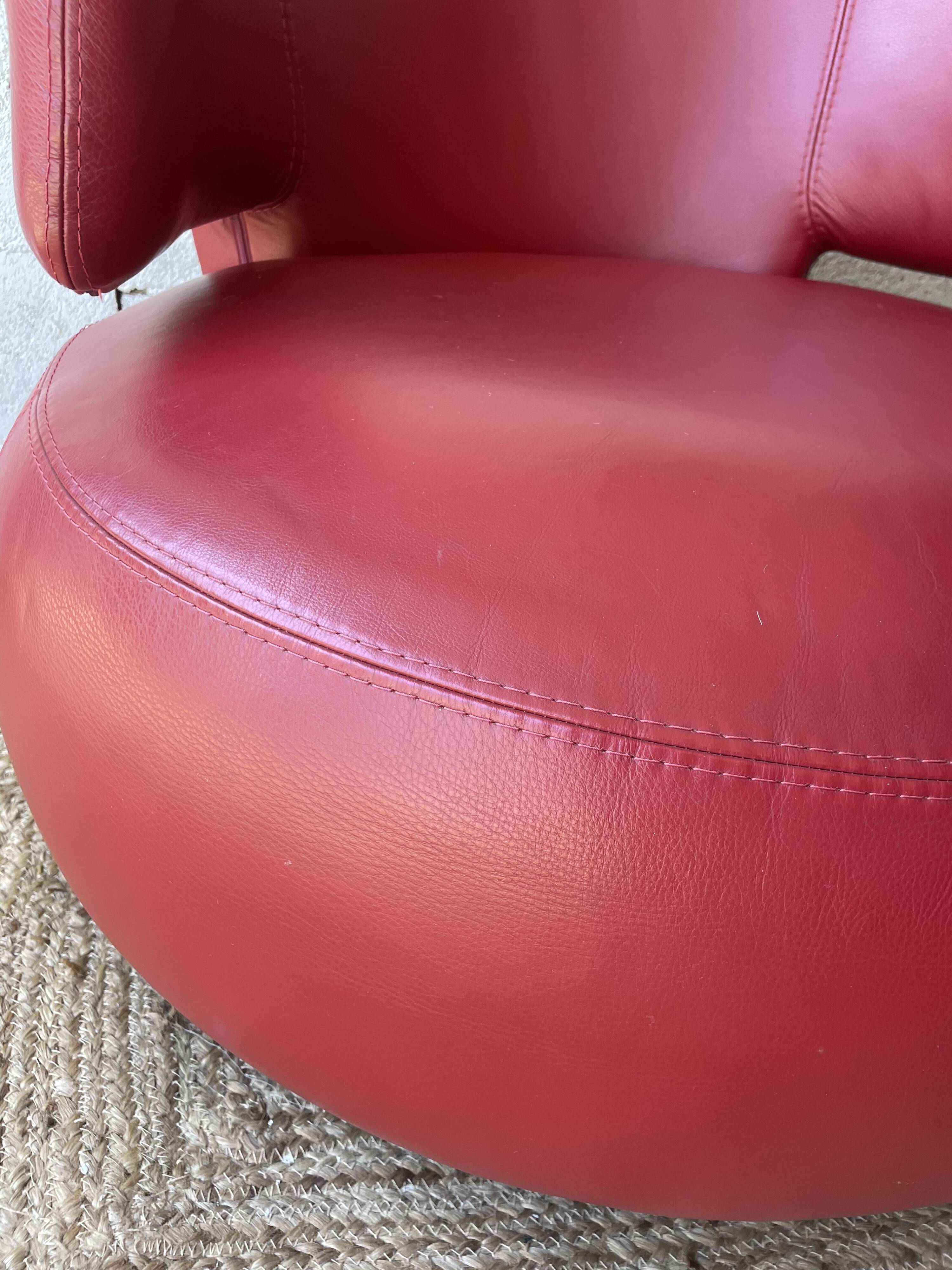 Curl armchair in red leather by Roche Bobois