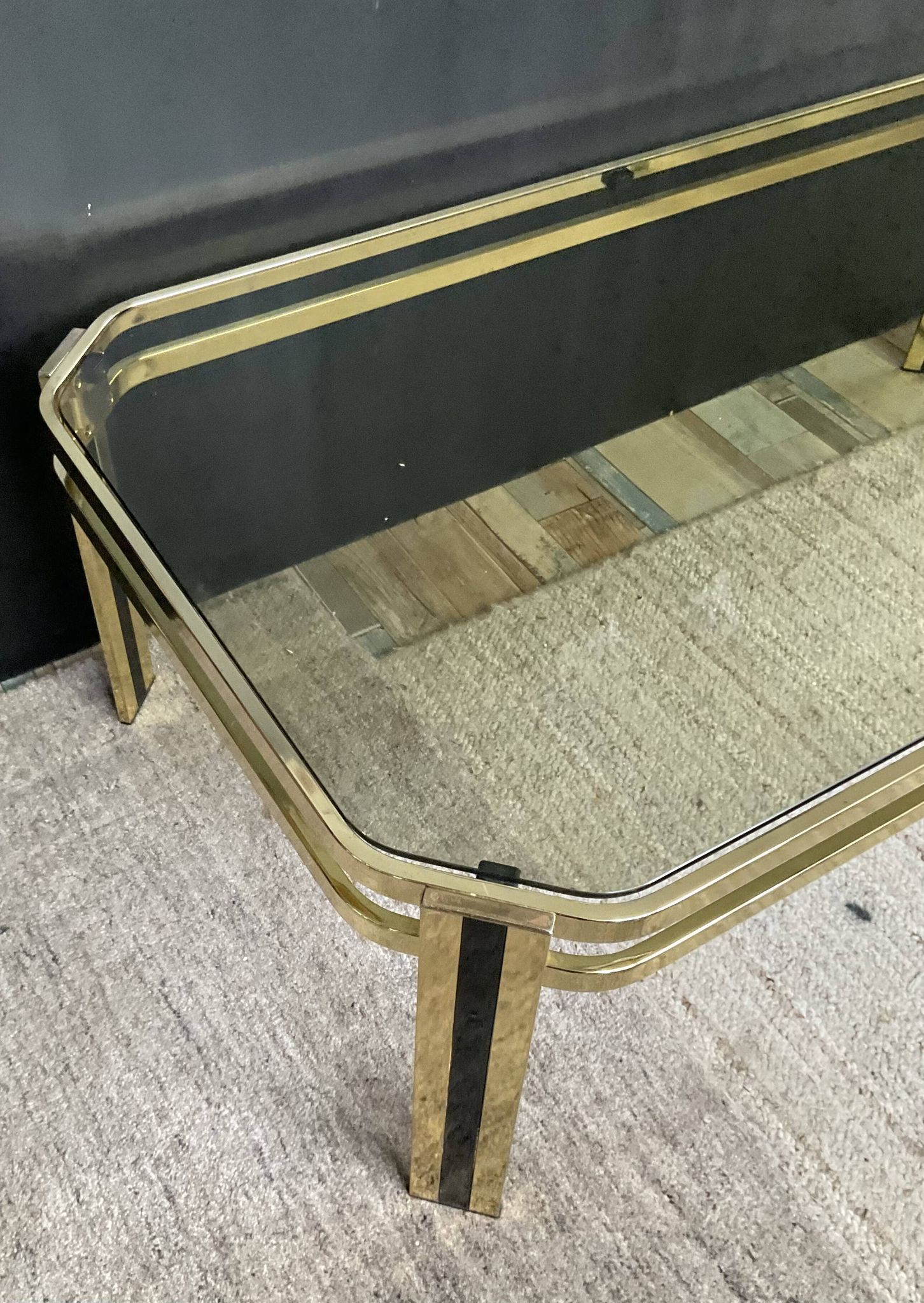 Vintage 1970s coffee table in gold metal and smoked glass.