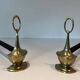 Pair of Bronze Chenets in Neoclassical Style in the Form of an Oil Lamp