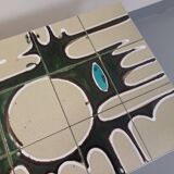 Vintage coffee table from the 60s and 70s in ceramic, chrome metal, and wood.