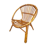 Old rattan armchair for child