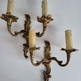 Ancienne paire d'appliques en métal doré style Louis XV - 2 lumières