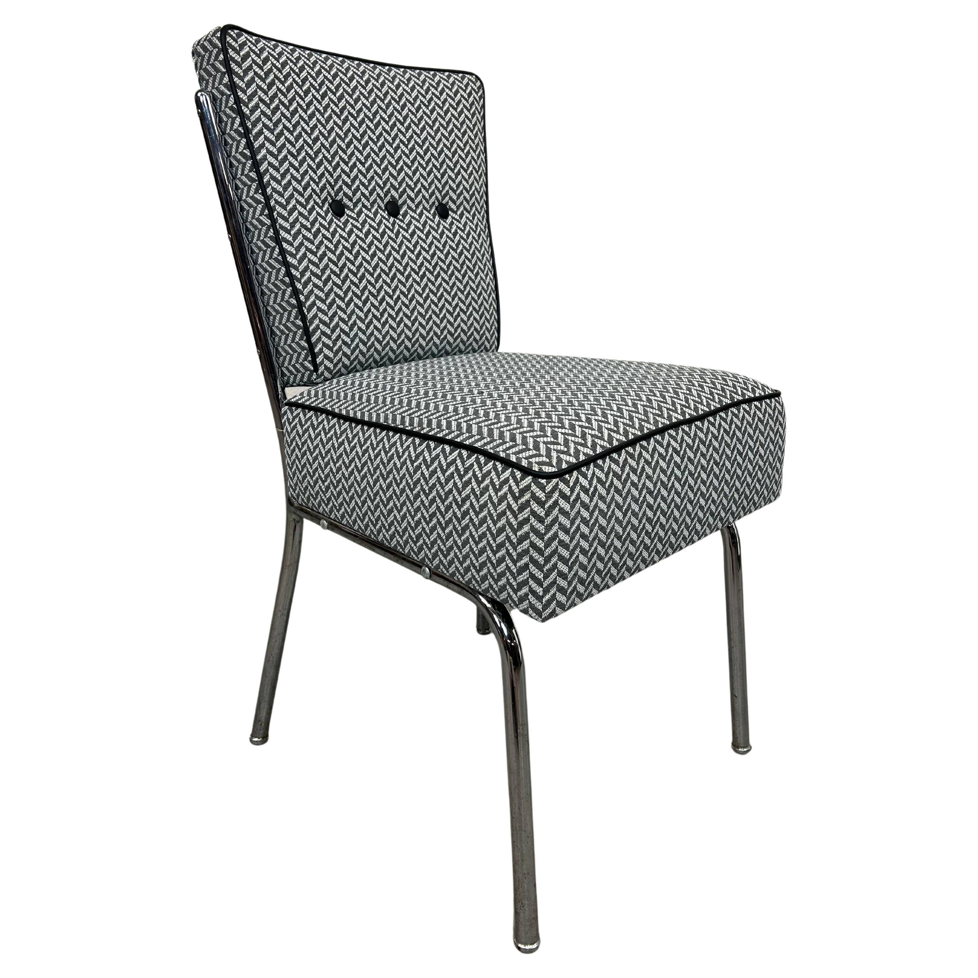Mid-century tubular steel chair by Jozsef Peresztegi