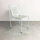Pair of mid century perforated steel stacking chairs