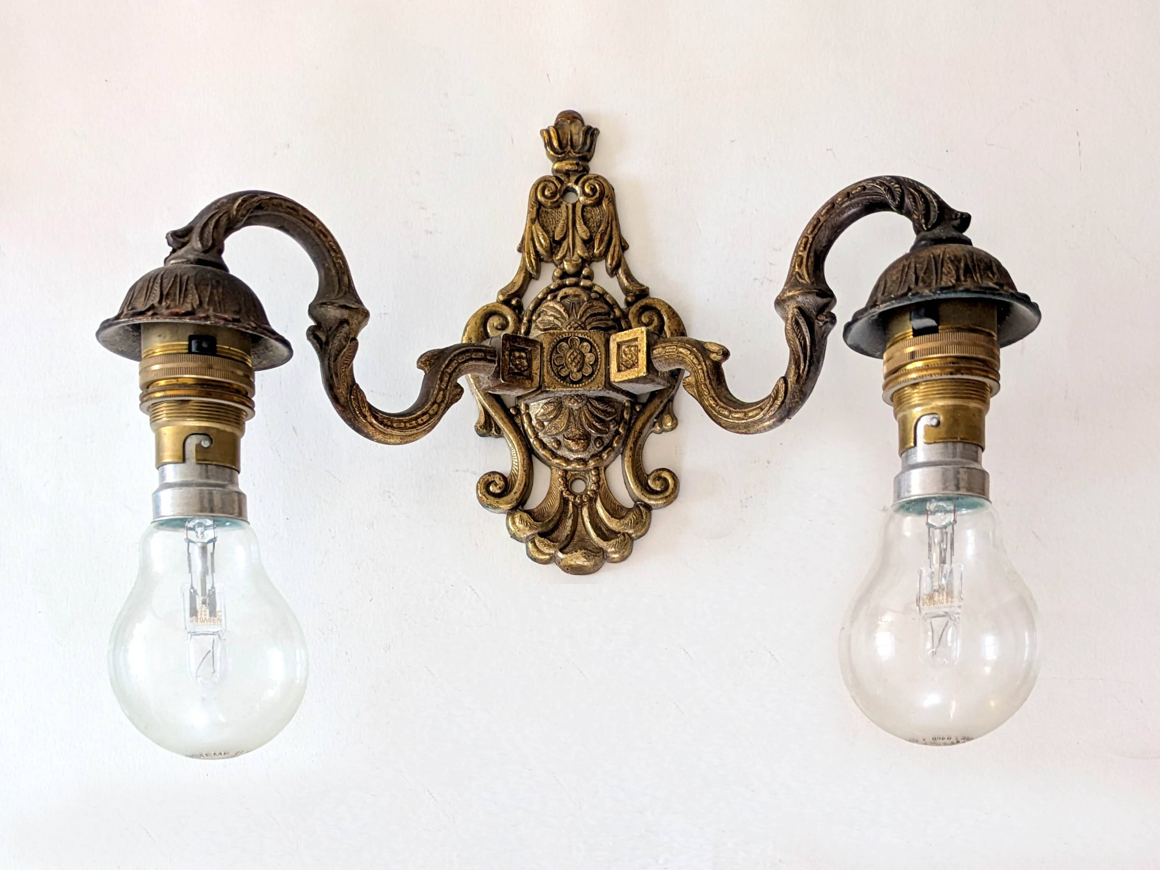 Two antique wall lights
