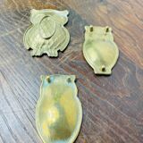 Brass owl emptiers
