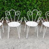 Garden furniture 1 table 4 armchairs in old white wrought iron.