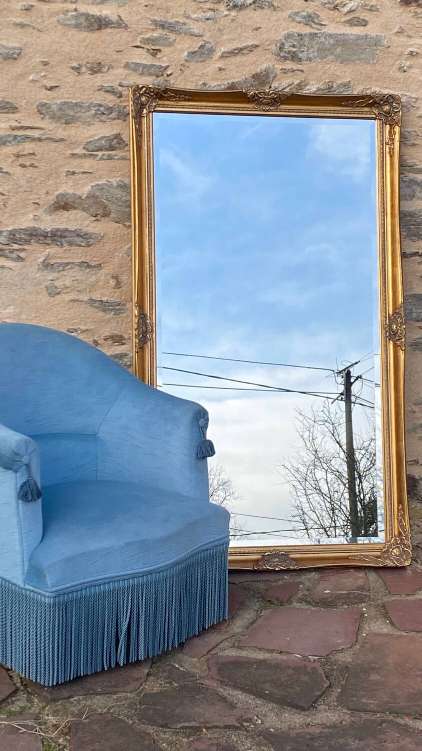 Large gilded carved wooden mirror