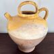 Yellow glazed jug