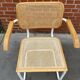 Cesca model chair with armrests white