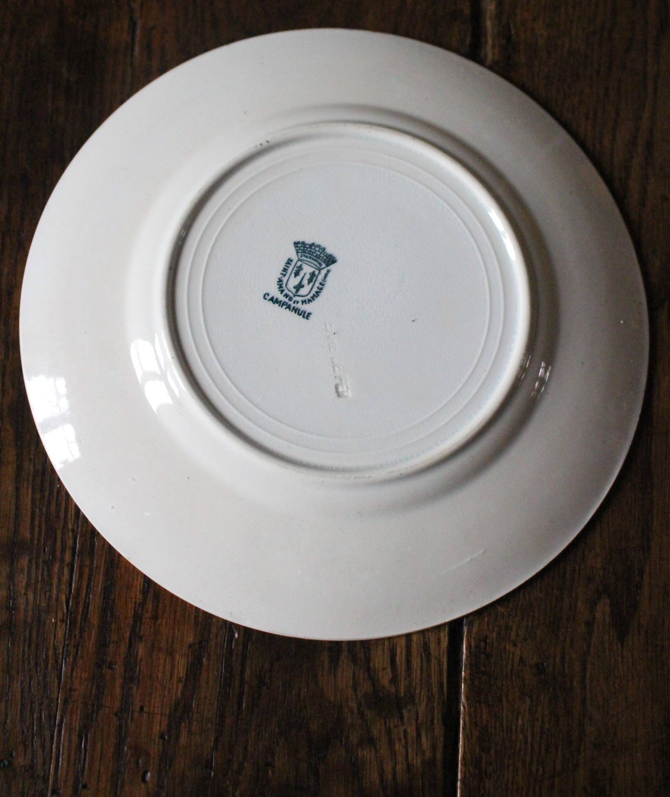 A set of 4 flat plates Terre de fer mismatched blue