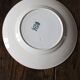 A set of 4 flat plates Terre de fer mismatched blue