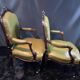 Paire de larges fauteuils XIXe en cuir vert de style Louis XV