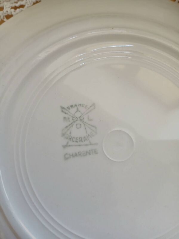 Lot 12 assiettes et plat Moulin des loups