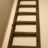 Flat roof ladder made of old wood