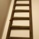 Old wooden flat roof ladder