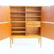 Large Swedish mahogany storage unit with four front doors.