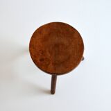 Old brutalist tripod stool in solid wood