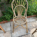 Round table with 2 rattan chairs