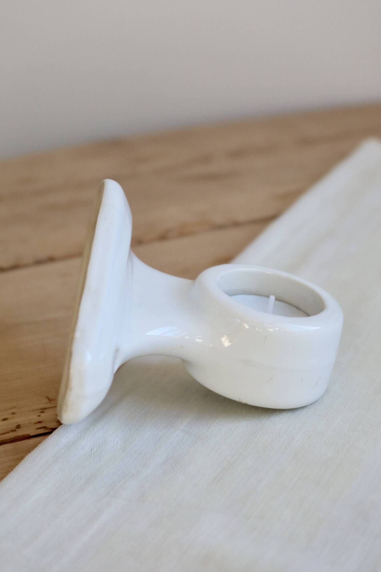Antique wall candle holder in white porcelain