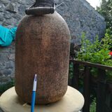 Old bottle covered with liege