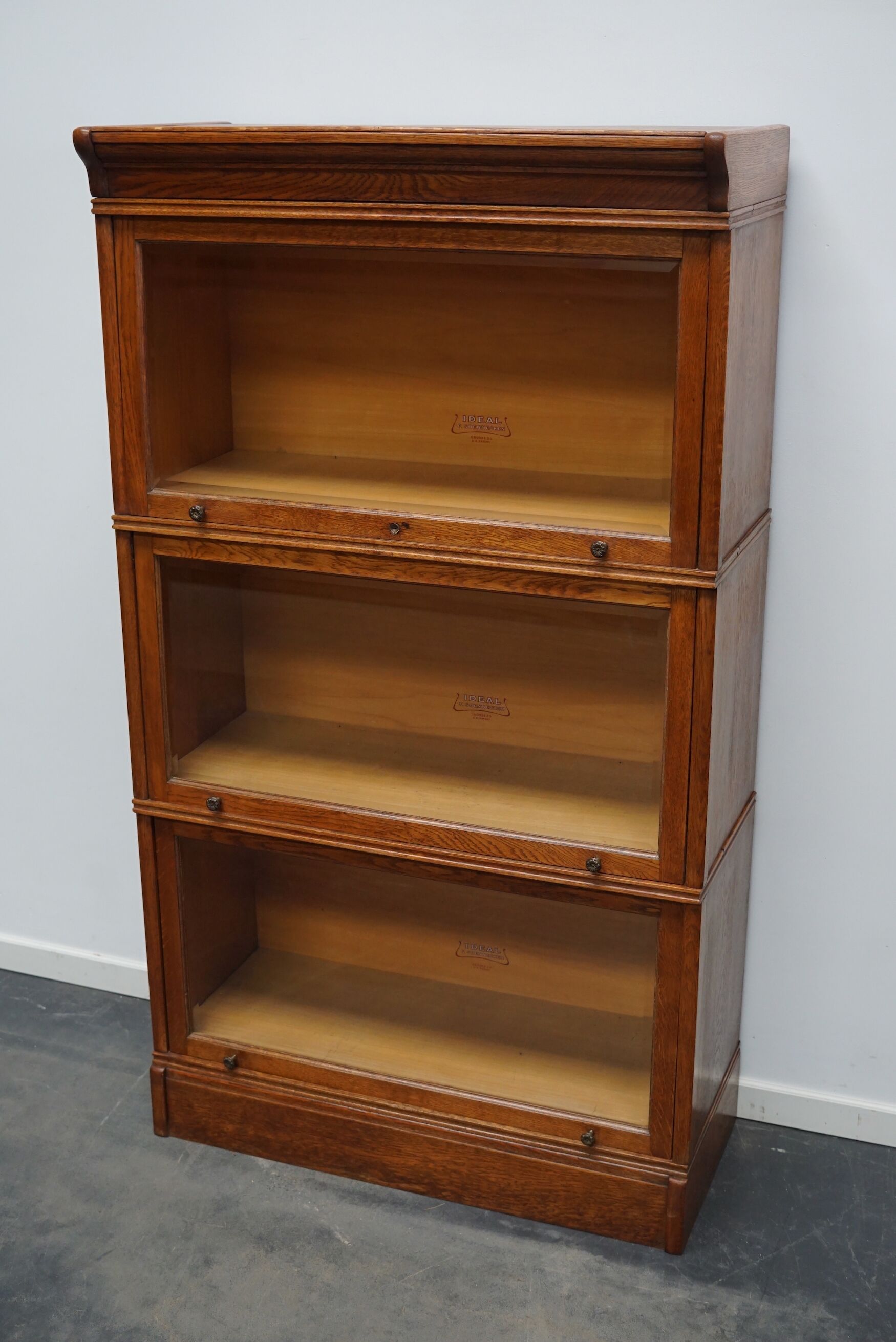 German oak bookcase with folding doors, ca 1900