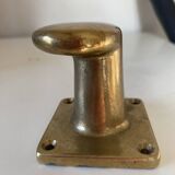 Pair of golden cast iron hooks