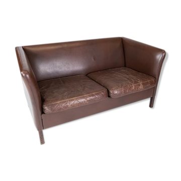 Two-seater dark brown leather sofa designed by Stouby Furniture.