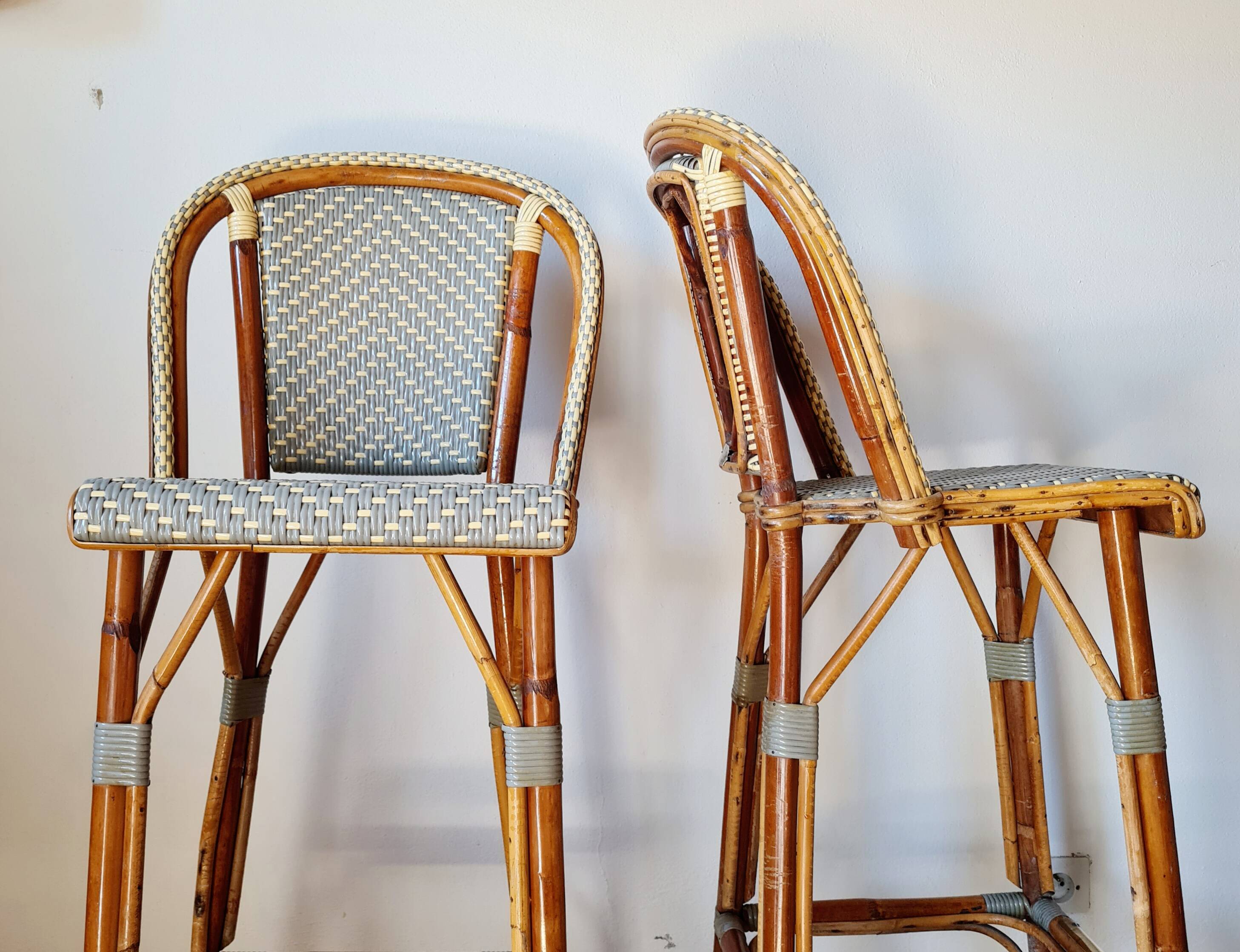 Vintage Gaty bar stools in two-tone rattan and caning.