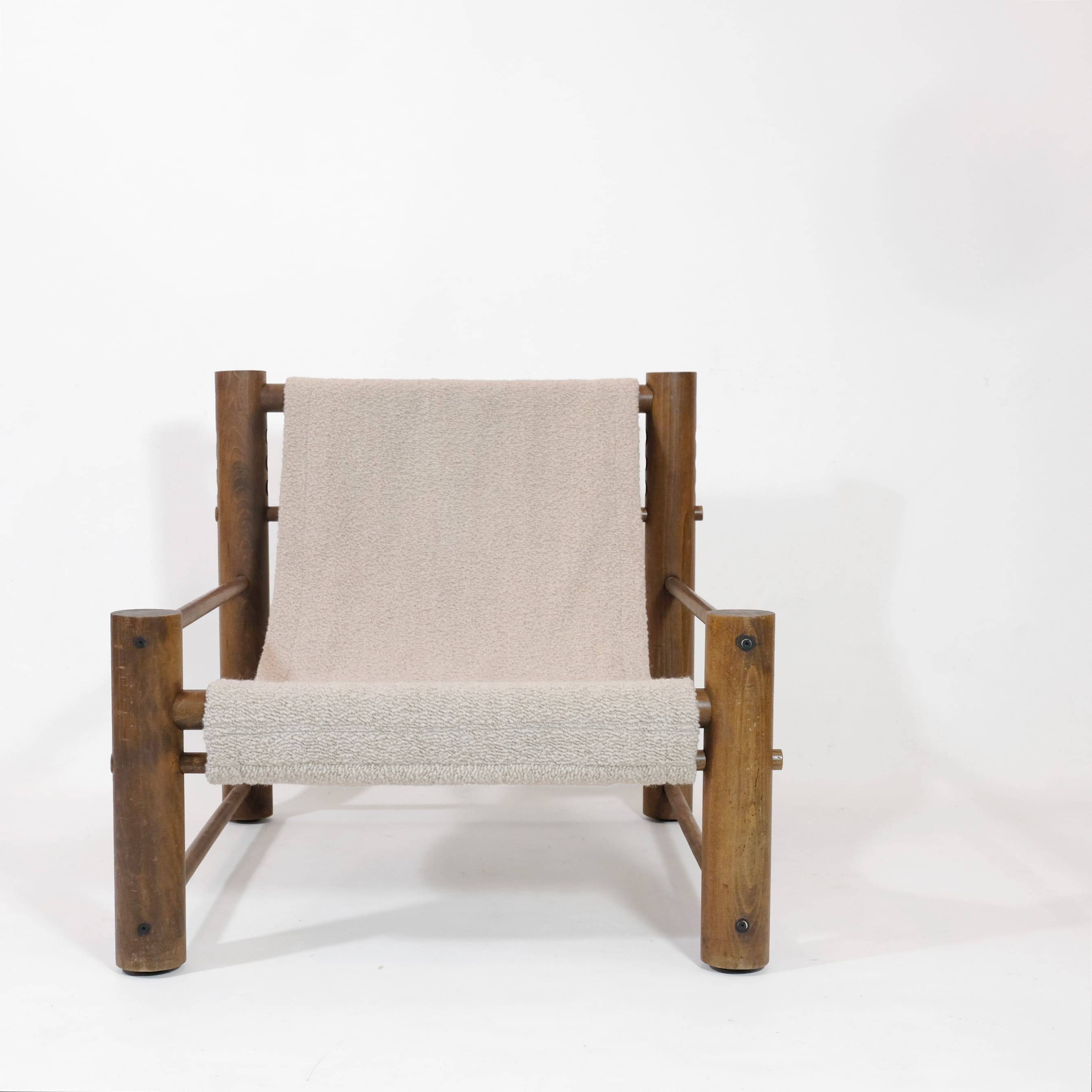 Solid wood armchair with adjustable backrest.