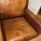 Ensemble de deux fauteuils en cuir de buffle.