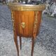 Oval bedside table in Louis XV style with marquetry.