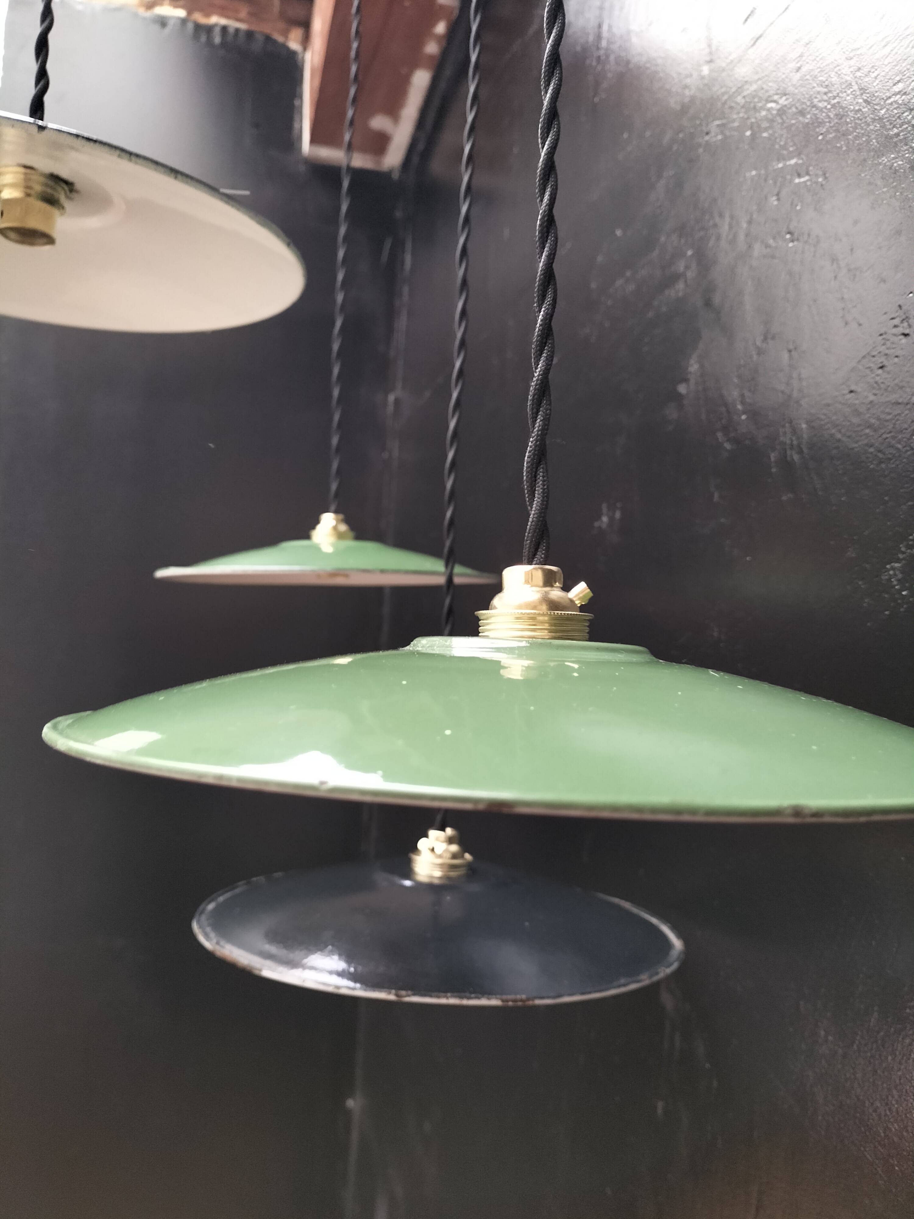 4 enameled sheet metal pendants