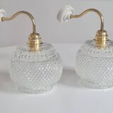 Pair of chiseled glass sconces