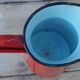 Red enamelled broc
