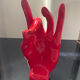 Vintage red ceramic hand paperweight