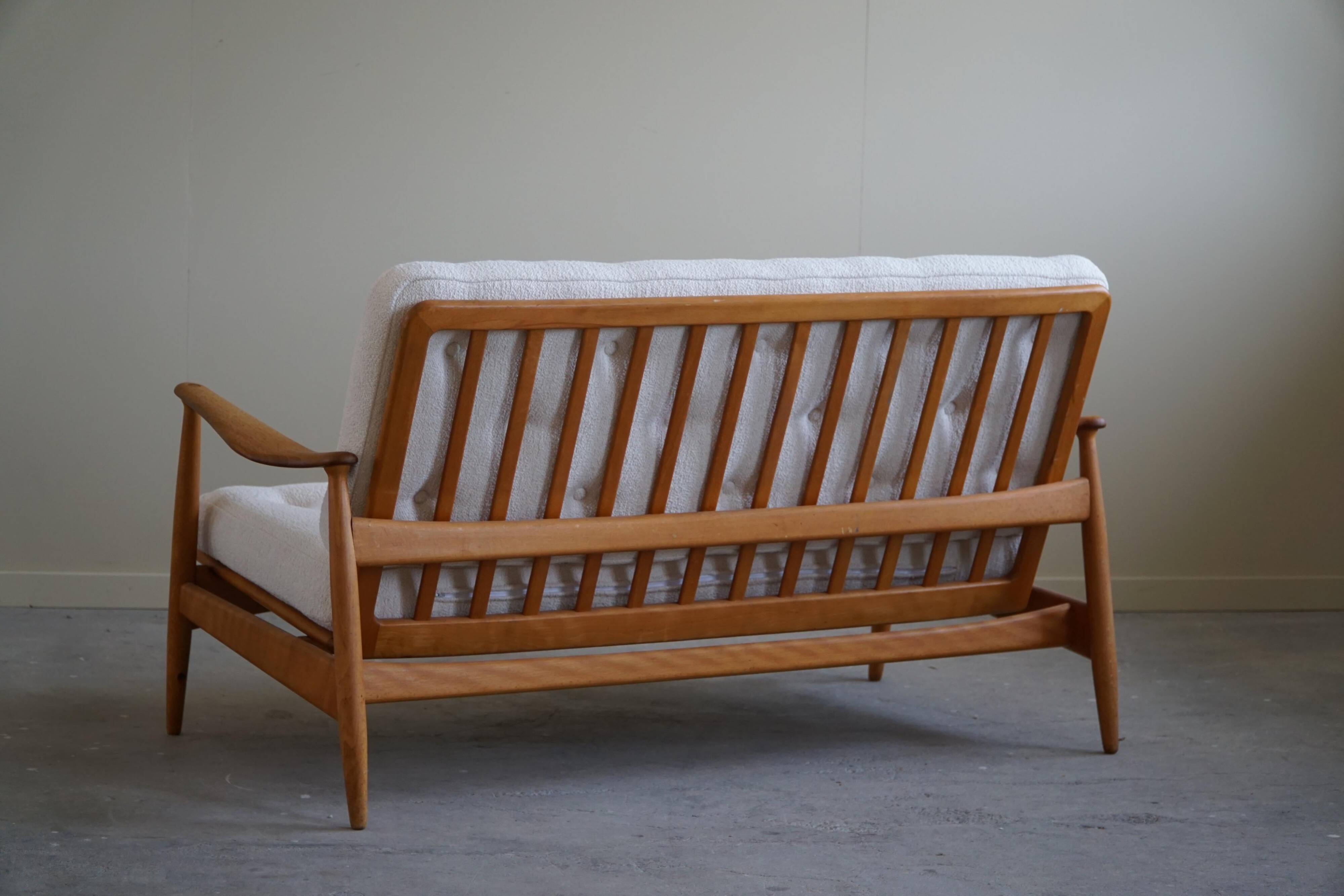 Two-seater canapé Arne Vodder, model Fd 161, reupholstered in boucle, 1950s.