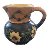 Old pitcher floral decoration