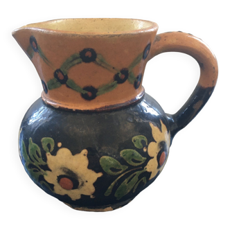 Old pitcher floral decoration