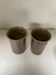 Pair of sandstone mugs